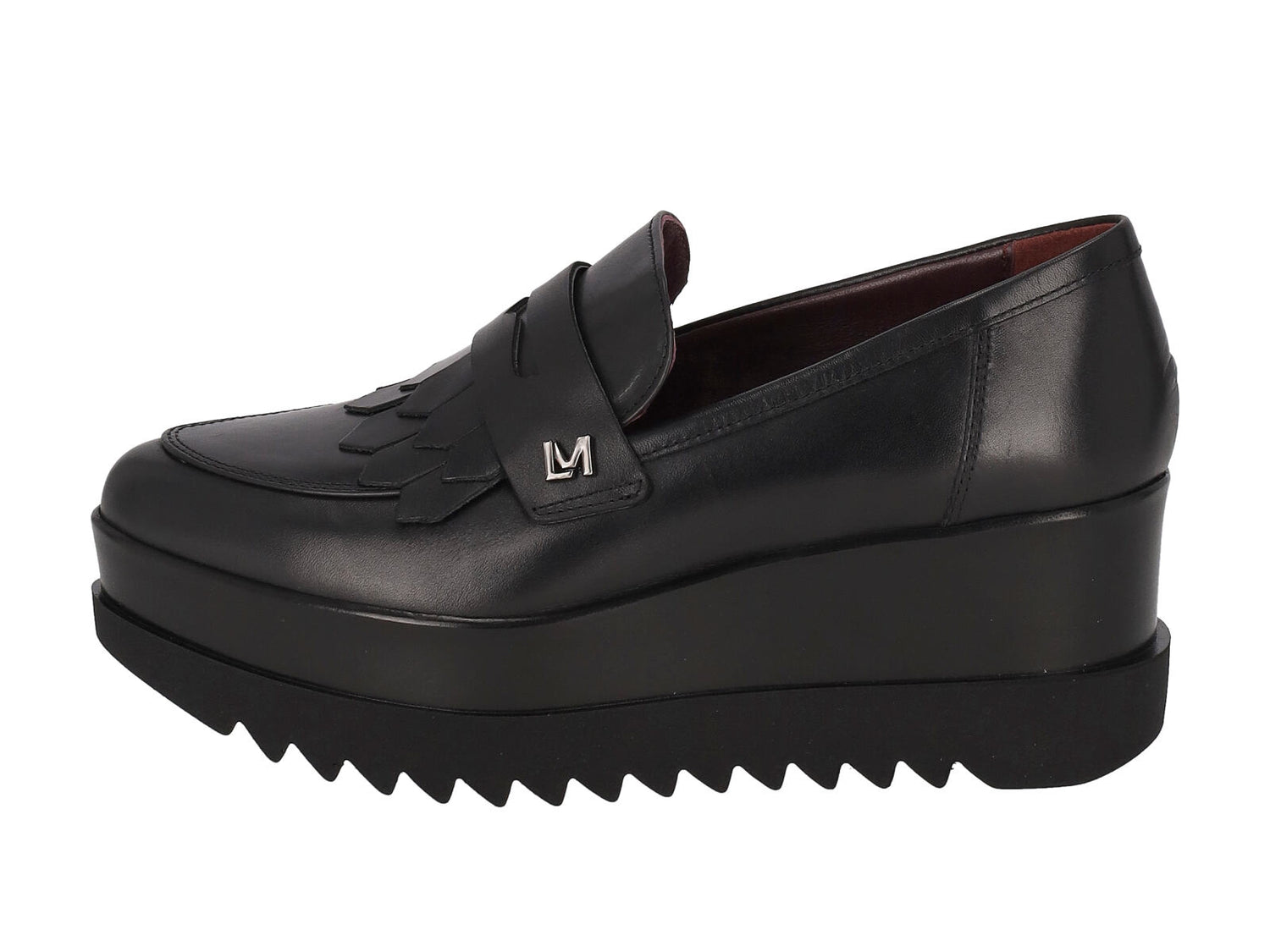 Mocassino in pelle con bendina , zeppa altezza 6 cm .