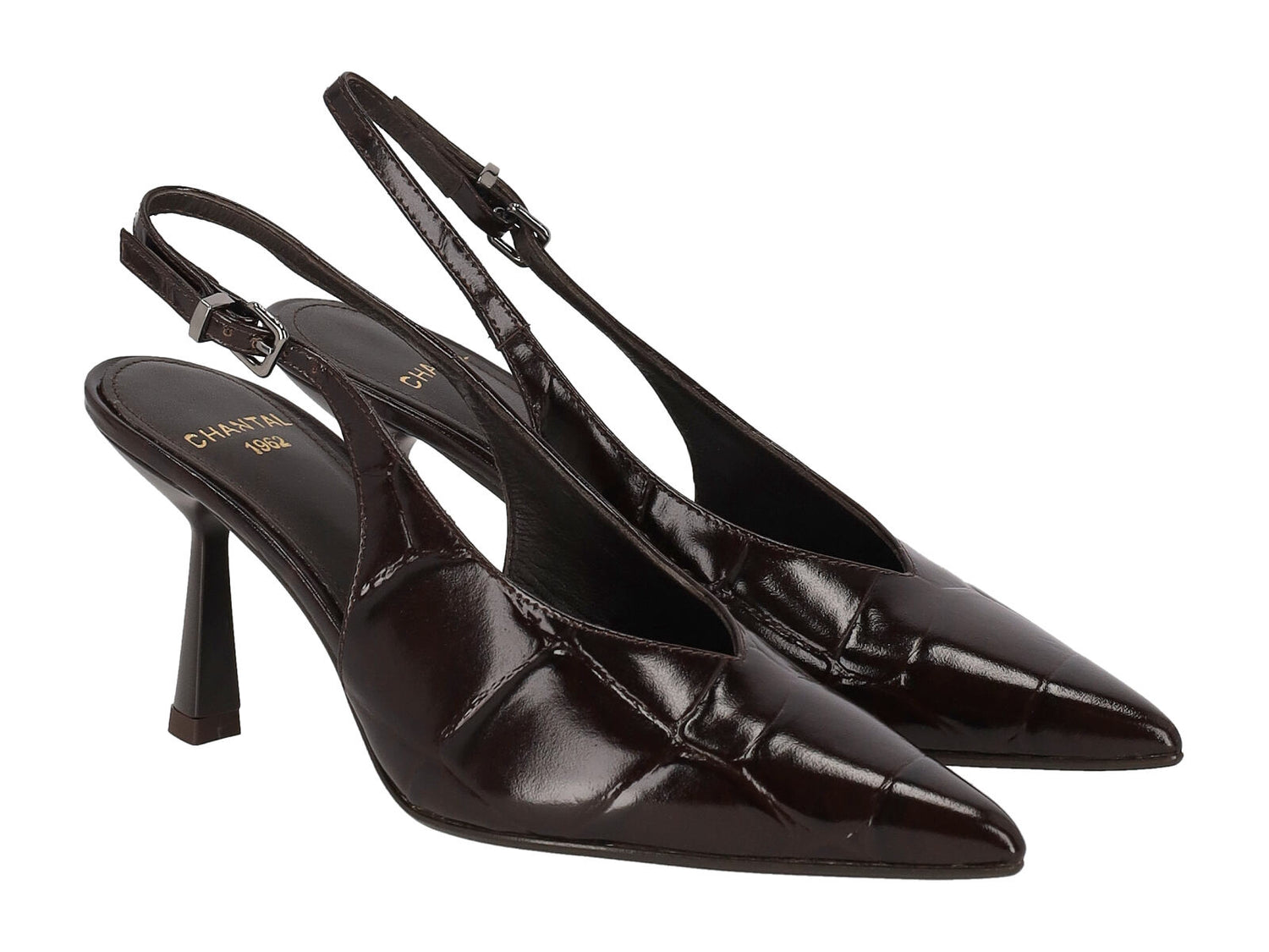 Chanel in pelle cocco , altezza tacco 7 cm .