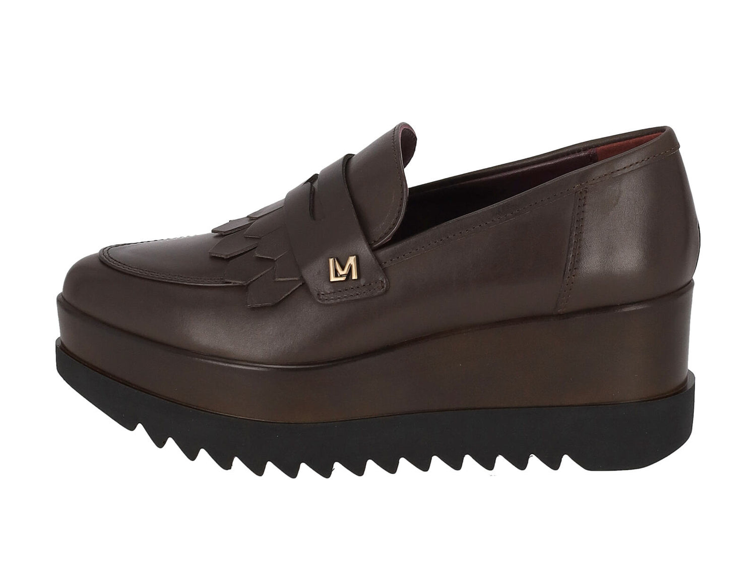 Mocassino in pelle con bendina , zeppa altezza 6 cm .