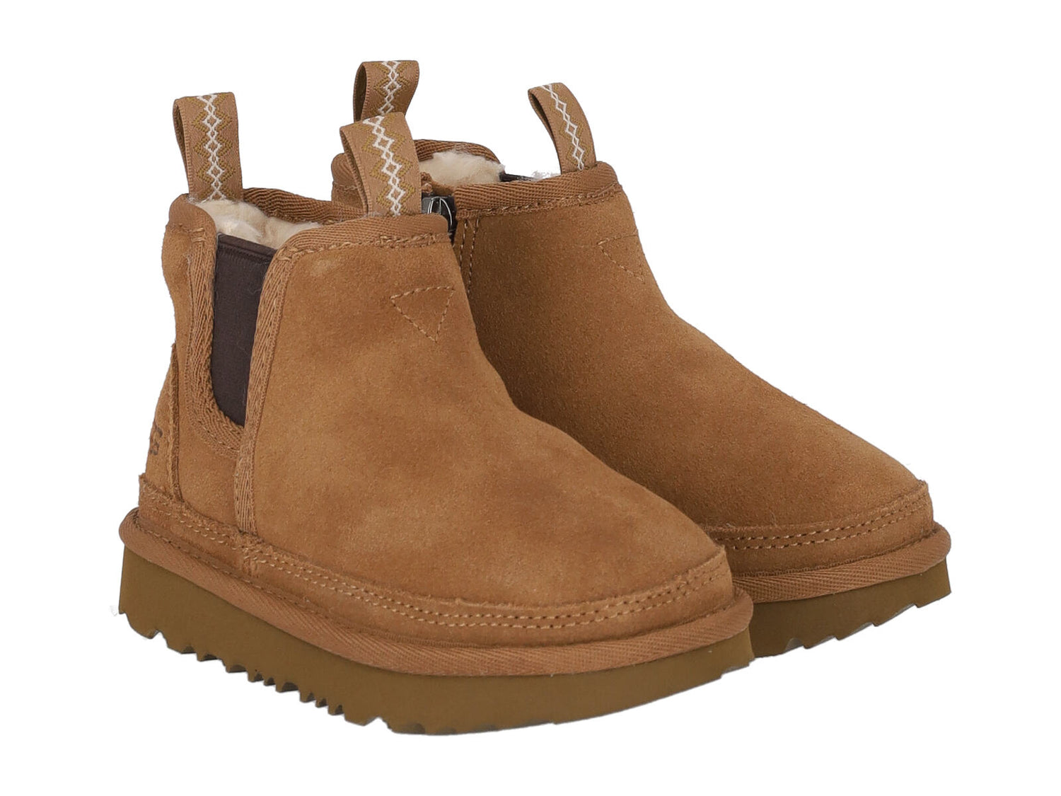 Stivaletto in camoscio con interno in montone , elastici ai lati