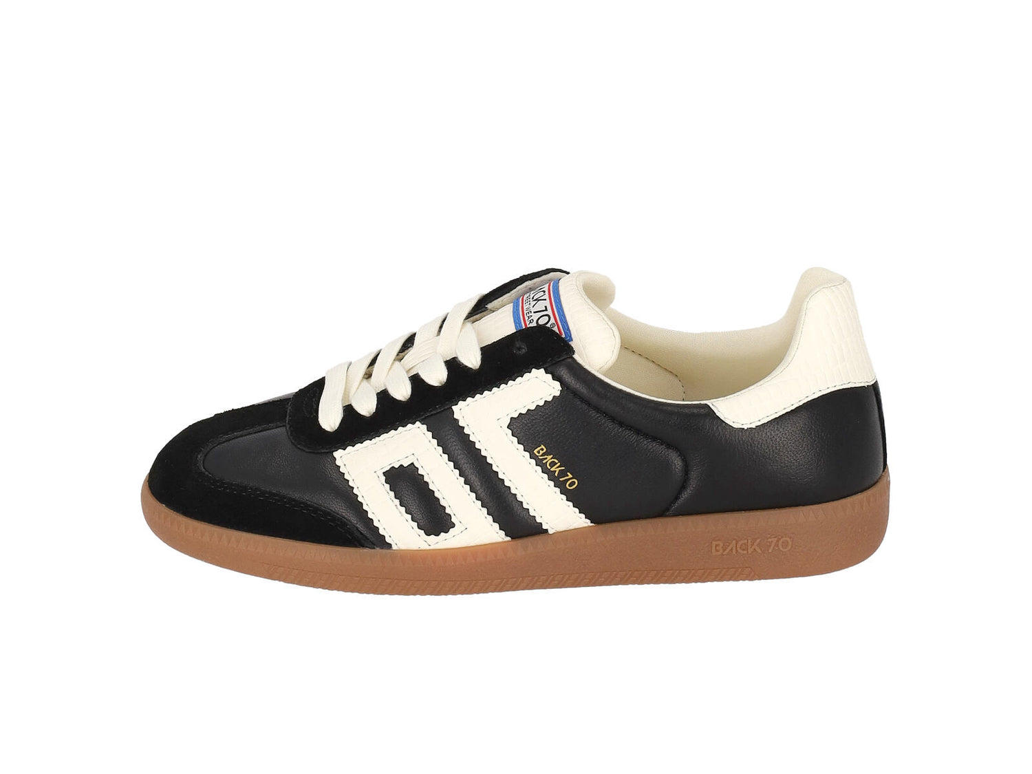 Sneakers in pelle e camoscio con riporto bianco.