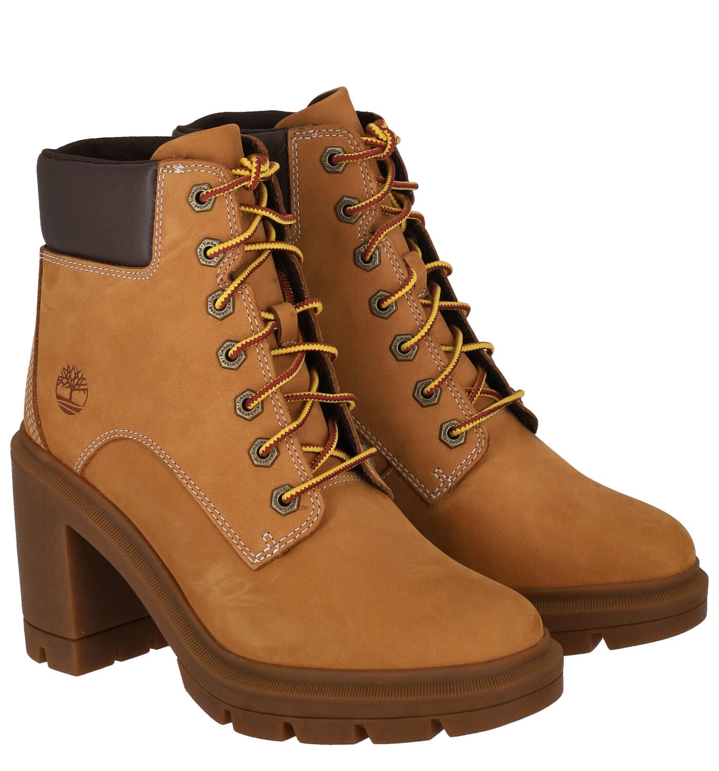 Tronchetto in nabuk con lacci e suola in gomma tacco largo altezza 9 cm .