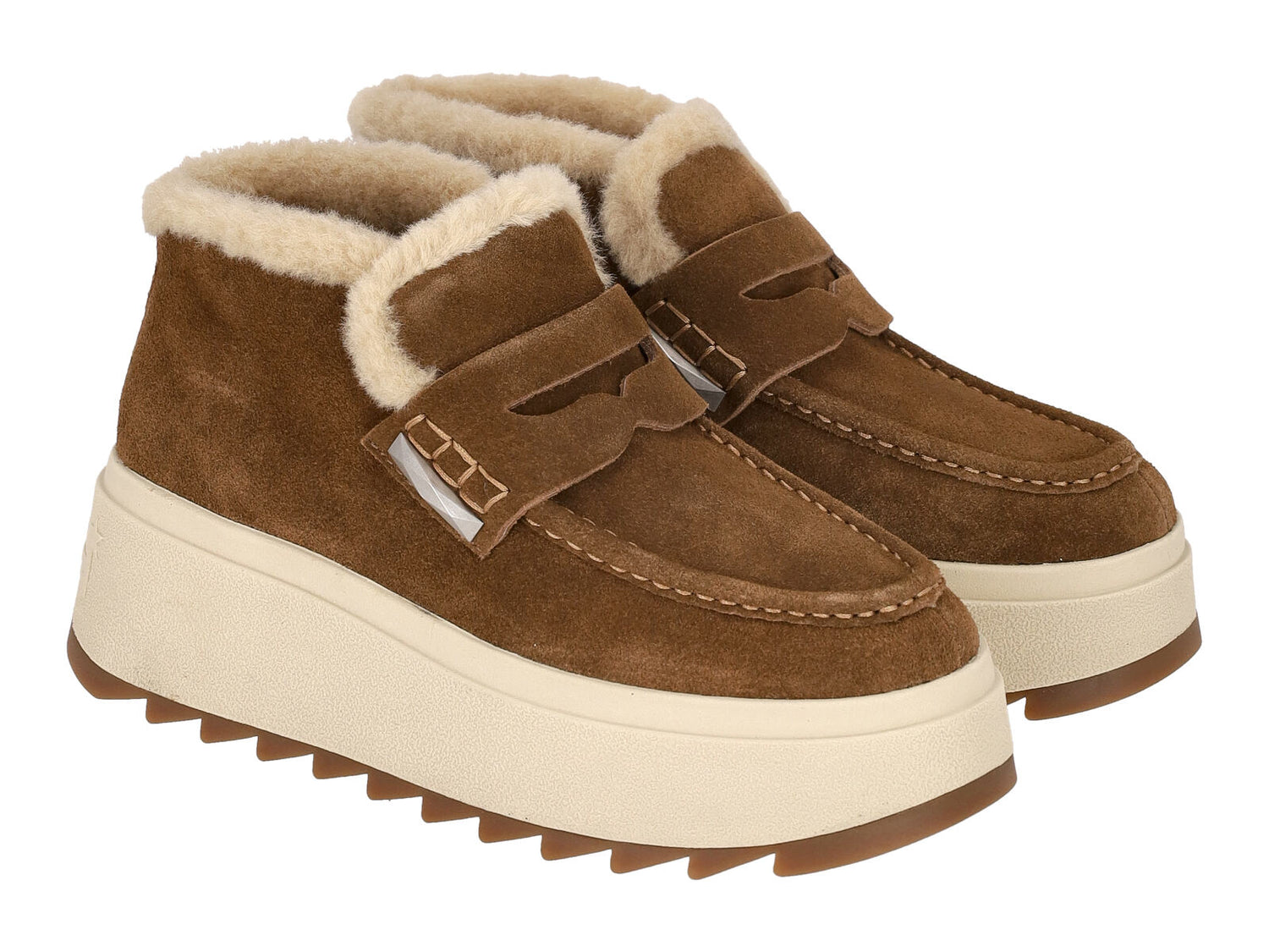 Stivaletto con suola in gomma con montone interno .