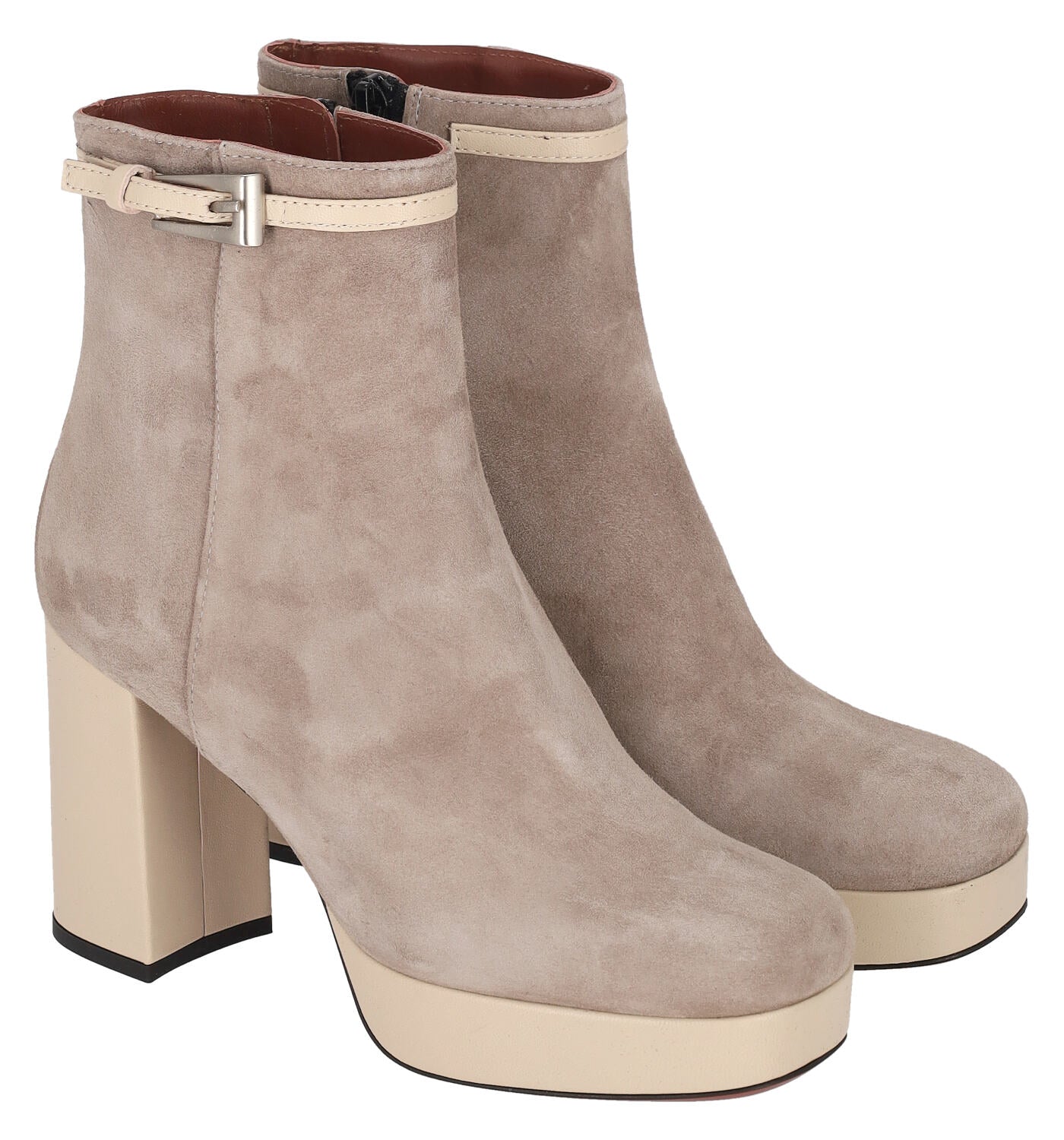 Tronchetto in camoscio e pelle chiusura con zip .