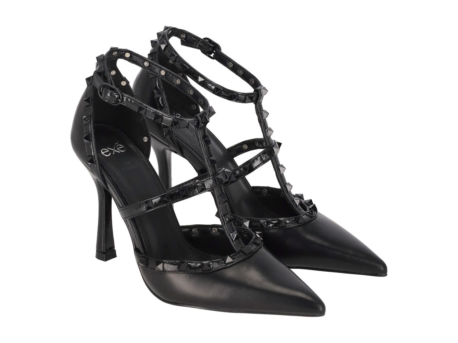 Scarpa T-bar con tacco altezza 10 cm e borchie. Cinturino regolabile.