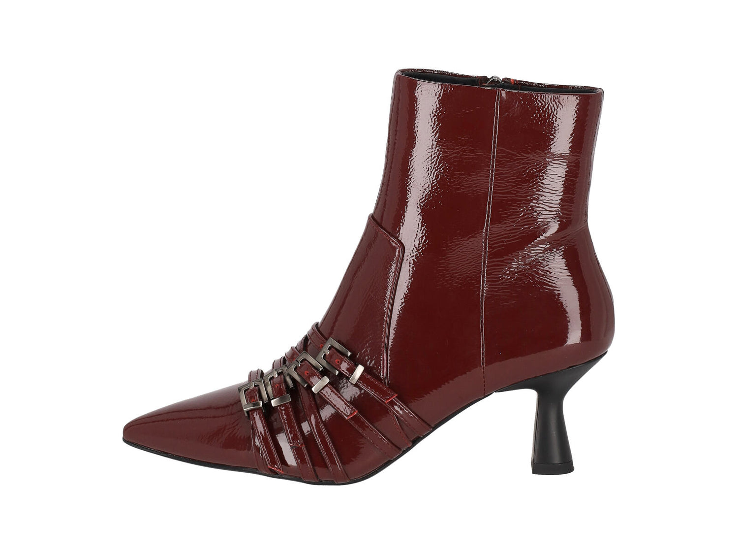 Tronchetto in naplak con fibbie in punta , chiusura con zip. Tacco altezza 6cm.