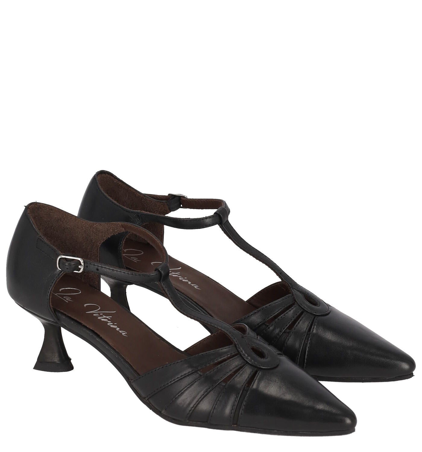 Decolleté t-bar in pelle con tacco altezza 5 cm .