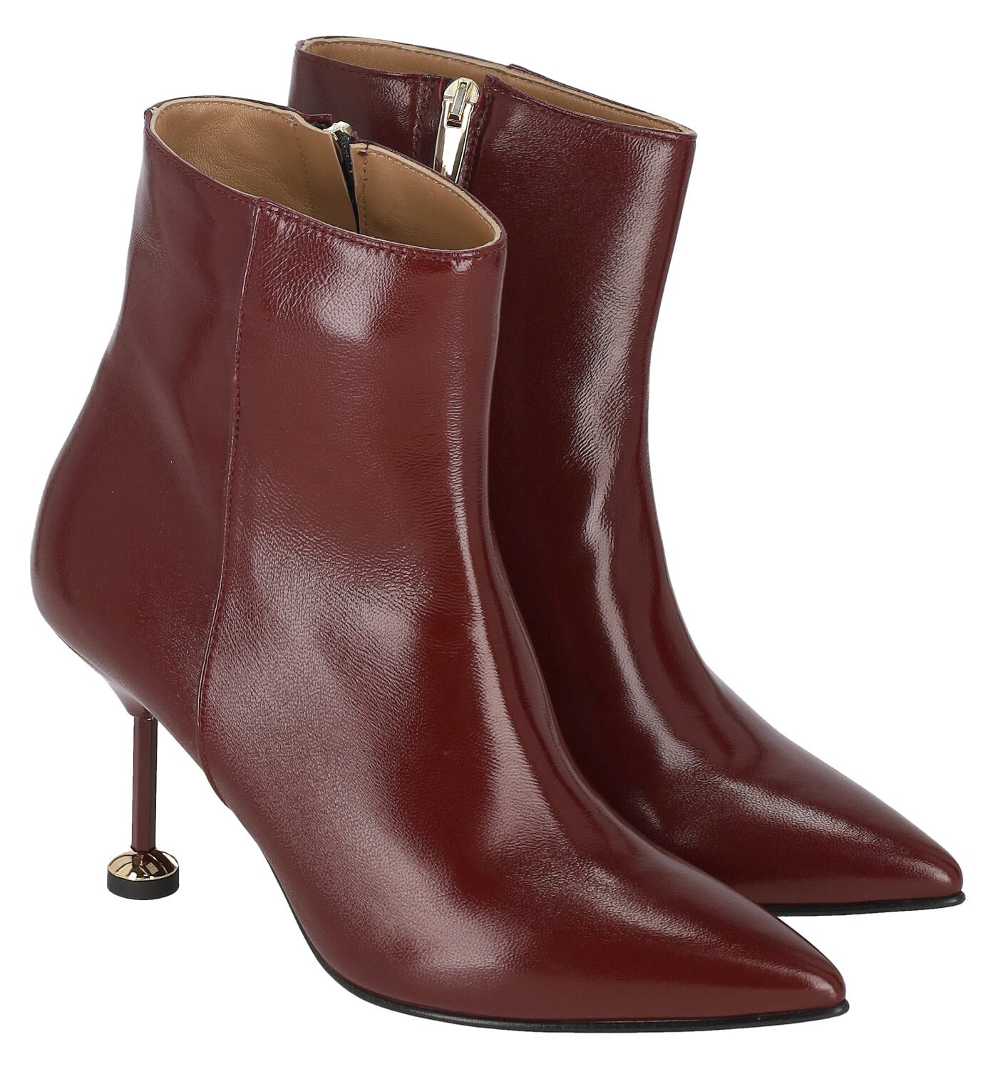 Tronchetto in pelle con tacco bottone oro , altezza 9cm.