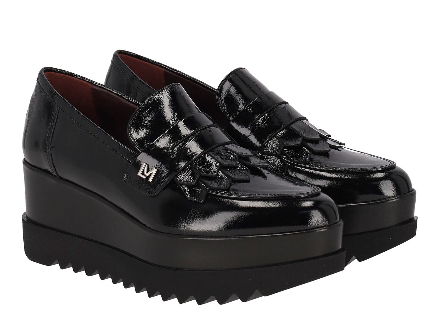 Mocassino in pelle di vernice con bendina e zeppa altezza 6 cm .